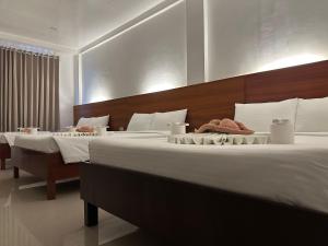 Voodi või voodid majutusasutuse Zosimo's Inn toas
