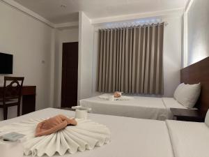 Voodi või voodid majutusasutuse Zosimo's Inn toas