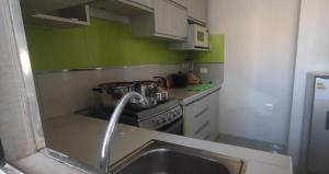 Nhà bếp/bếp nhỏ tại CASA HOSPEDAJE Conquistadores Inn