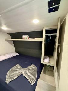 Ένα ή περισσότερα κρεβάτια σε δωμάτιο στο Hogar sobre ruedas