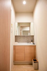 Phòng tắm tại Gouhou Garden Hotel Asakusa