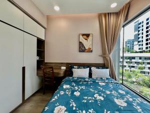 Postel nebo postele na pokoji v ubytování Anna Green Apartment Aeon Tân Phú + 13 fotografií