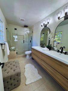a bathroom with a large sink and a shower at Beach Life in Belmont Shore in Long Beach