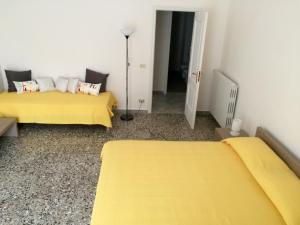 Postel nebo postele na pokoji v ubytování B&B Zia Iaia