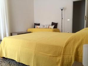 Postel nebo postele na pokoji v ubytování B&B Zia Iaia