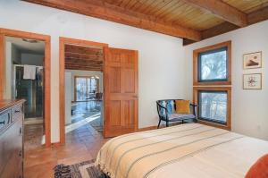 a bedroom with a bed and a wooden ceiling at Casa Salida! 1 Mile From Dwntwn, Private Hot Tub in Salida +33 photos