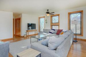 a living room with a couch and a table at Casa Salida! 1 Mile From Dwntwn, Private Hot Tub in Salida