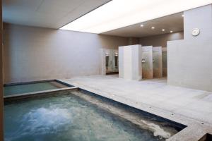 a swimming pool in the middle of a building at OakValley Resort Hills Village in Wonju +24 photos