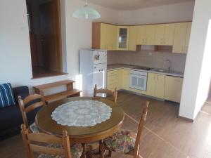 Kuchyň nebo kuchyňský kout v ubytování Apartments Maslina + 8 fotografií