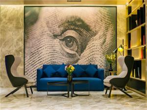 Uma área de estar em Echarm Hotel Xi'an Dayan Tower Datang Lively District