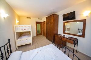 Postel nebo postele na pokoji v ubytování Hotel Sarajet e Pashait 2