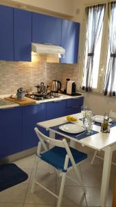 A kitchen or kitchenette at Le Casette