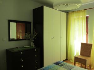 Postel nebo postele na pokoji v ubytování Tower Suites Korcula