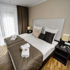 Ein Bett oder Betten in einem Zimmer der Unterkunft Landhaus Ambachhof