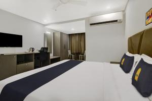 Hotel O D Suites客房内的一张或多张床位