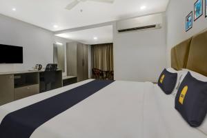 Hotel O D Suites客房内的一张或多张床位