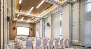 A área empresarial e/ ou a sala de conferências de Metropolo Hotel Yining Development Zone Hanma Building