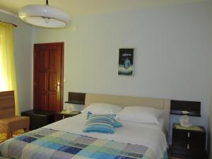 Postel nebo postele na pokoji v ubytování Tower Suites Korcula