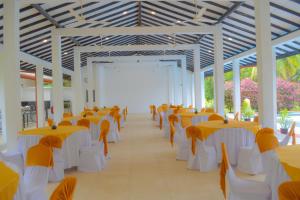 a row of tables and chairs in a room at Hotel Water Nest in Etagama +69 photos
