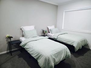Ένα ή περισσότερα κρεβάτια σε δωμάτιο στο Nagambie Living