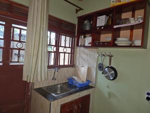 Η κουζίνα ή μικρή κουζίνα στο Serenity homes +16 φωτογραφίες