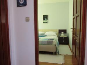 Postel nebo postele na pokoji v ubytování Tower Suites Korcula