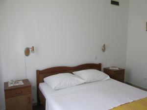Postel nebo postele na pokoji v ubytování Tower Suites Korcula