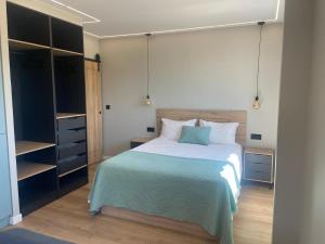Ένα ή περισσότερα κρεβάτια σε δωμάτιο στο Chouciña Apartments
