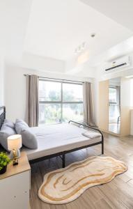 Ένα ή περισσότερα κρεβάτια σε δωμάτιο στο Warm & Spacious 2-Bedroom +93 φωτογραφίες