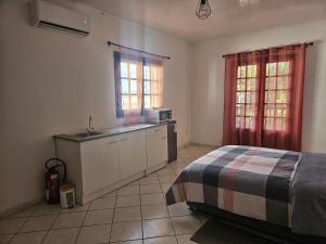 Katil atau katil-katil dalam bilik di Chambre Corail
