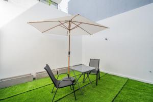 En terrasse eller udendørsområde på Wolu Loft 28 - 1BR North Canggu