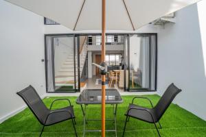 Et opholdsområde på Wolu Loft 28 - 1BR North Canggu