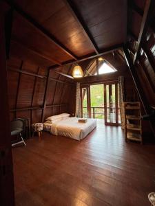 Postel nebo postele na pokoji v ubytování Da Villa Mandalika