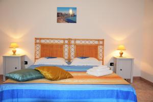 Posteľ alebo postele v izbe v ubytovaní Salenterra B&B (Salento)