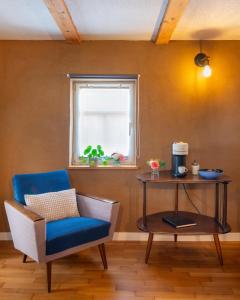 Posezení v ubytování Ferienappartement Enzianshaus + 46 fotografií
