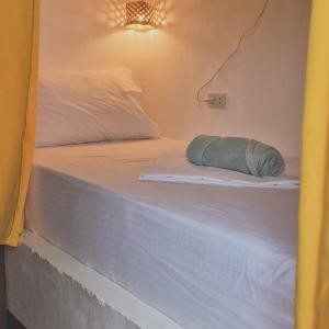 Postel nebo postele na pokoji v ubytování Camotes Hostel Resort