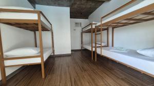 Postel nebo postele na pokoji v ubytování Camotes Hostel Resort