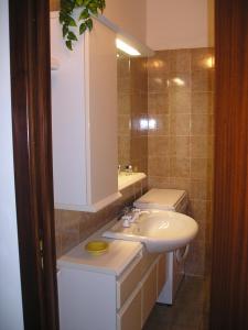 a bathroom with a sink and a mirror at GallyBi in Gallipoli +99 photos