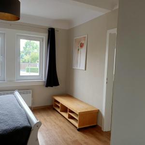 Postel nebo postele na pokoji v ubytování Ferienwohnung H2 am Hainich