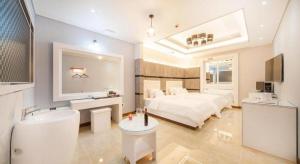Katil atau katil-katil dalam bilik di SH Hotel