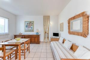 TV a/nebo společenská místnost v ubytování Residence Trande a Leuca