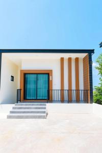 a rendering of a house with a balcony at Sawaddee Pua Homestay(Cozy Home) in Pua