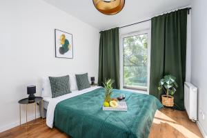 Lumina luxury apart for family next to Księży Młynにあるベッド