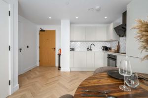 Η κουζίνα ή μικρή κουζίνα στο Cottonopolis Suite