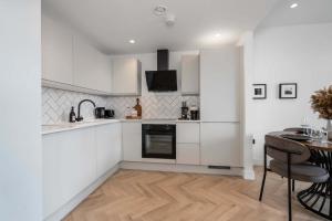 Η κουζίνα ή μικρή κουζίνα στο Cottonopolis Suite +17 φωτογραφίες