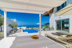 Casa Roque del Mar Private Villa with Heated Saltwater Pool, Jacuzzi & Ocean Views في أديخي: فيلا مطلة على المحيط