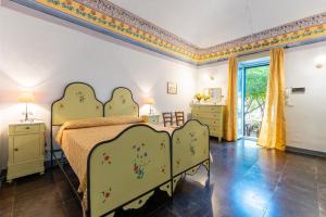 Giường trong phòng chung tại Villa Aguglie Con Piscina +86 ảnh