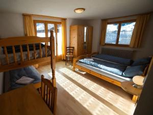 Postel nebo postele na pokoji v ubytování Swiss Alps Coliving Community Stay for Remote Workers