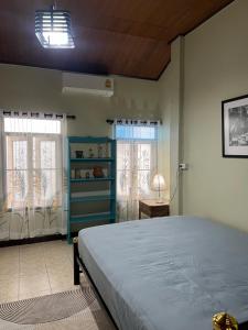 Postel nebo postele na pokoji v ubytování Chillin' Guest house