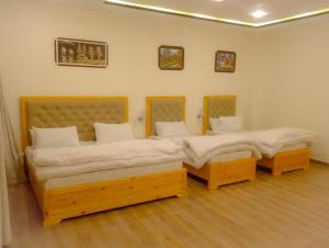 Ένα ή περισσότερα κρεβάτια σε δωμάτιο στο Snow valley hotel and restaurant